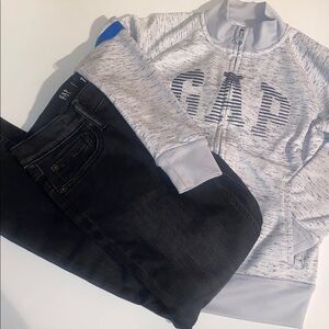 GAP Heather Gray Jacket with Blue Accents and Black Ripped GAP Jeans.